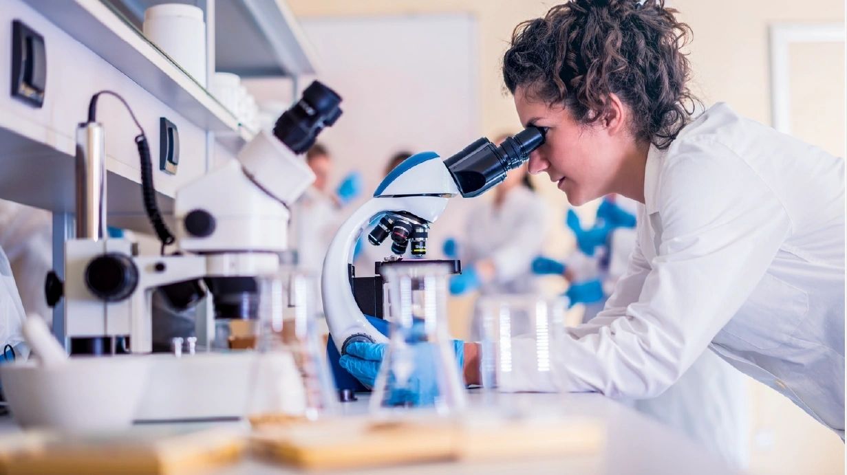 More Research on Oocyte Biology: Degradative Super-Organelles Woman 20with 20microscope